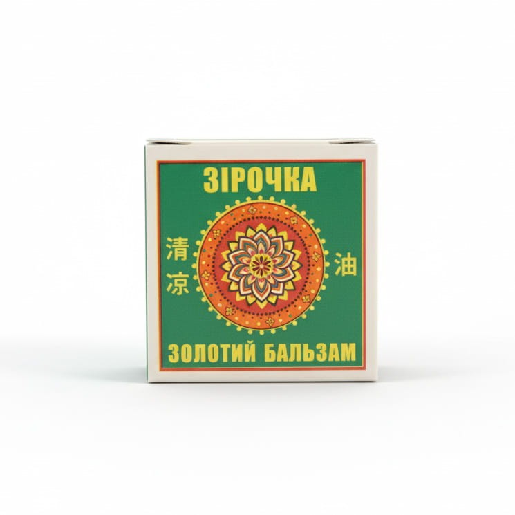 Złoty balsam Ziroczka marki Krasota i Zdrowie w  małym czerwonym pudełeczku z żółtą gwiazdą i zielonym opakowaniu kartonowym. Produkt aromaterapeutyczny o pojemności 4g,  intensywny zapach olejków eterycznych, wspomaga przy zatkanych zatokach, bólu głowy.